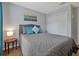 Bright bedroom featuring a queen-size bed and ample closet space at 2758 Sun Key Pl, Kissimmee, FL 34747