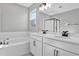 Bathroom with double vanity, soaking tub, and shower at 4063 Bannock Ave, Tavares, FL 32778