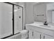 Bathroom with shower, toilet and vanity at 4063 Bannock Ave, Tavares, FL 32778