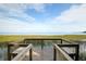 Wooden dock offering tranquil lake views at 4063 Bannock Ave, Tavares, FL 32778