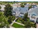 Luxury home with a wrap around porch, situated in a upscale neighborhood with golf course views at 7714 Excitement Dr, Reunion, FL 34747