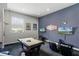 Game room with pool table, big screen TVs, and comfortable seating at 7714 Excitement Dr, Reunion, FL 34747