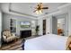 Main bedroom with king-size bed, walk-in closet, and ensuite bathroom access at 7714 Excitement Dr, Reunion, FL 34747
