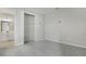 Bedroom with carpet, closet, and en-suite bathroom at 180 Flag Lilly Ln, Umatilla, FL 32784