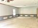 Living room with tile floors and wainscoting at 2086 Camelot Blvd, St Cloud, FL 34772