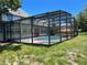 Screened-in pool with a spacious deck area at 2086 Camelot Blvd, St Cloud, FL 34772