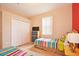 Bedroom with two twin beds, dresser, and closet at 648 Copeland Dr, Haines City, FL 33844