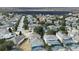 Aerial view showcasing a desirable neighborhood with lake access at 648 Copeland Dr, Haines City, FL 33844