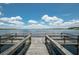 Serene waterfront view from a wooden dock with calm waters at 648 Copeland Dr, Haines City, FL 33844