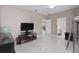 Bedroom with TV, globe, and built-in shelving at 5222 Waterside Vista Ln, St Cloud, FL 34771