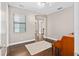 Bright home office with hardwood floors and a piano at 5222 Waterside Vista Ln, St Cloud, FL 34771