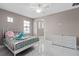 Bright bedroom with white bed frame and plenty of natural light at 5222 Waterside Vista Ln, St Cloud, FL 34771