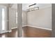 Spacious dining room with hardwood floors and modern light fixture at 5222 Waterside Vista Ln, St Cloud, FL 34771