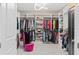 Spacious walk-in closet with ample shelving and hanging space at 5222 Waterside Vista Ln, St Cloud, FL 34771