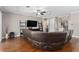Home theater with large sectional sofa and built-in shelving at 5222 Waterside Vista Ln, St Cloud, FL 34771