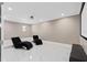 Spacious home theater with large screen and comfortable seating at 5222 Waterside Vista Ln, St Cloud, FL 34771