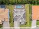 Aerial view of house with pool and surrounding homes at 5222 Waterside Vista Ln, St Cloud, FL 34771