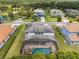 Aerial view showcasing a home with a pool and screened enclosure at 5222 Waterside Vista Ln, St Cloud, FL 34771