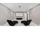 Finished basement home theater with projector, screen, and comfortable seating at 5222 Waterside Vista Ln, St Cloud, FL 34771
