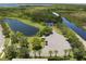 Aerial view of community with lake access and lush landscape at 5222 Waterside Vista Ln, St Cloud, FL 34771