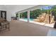 Relaxing pool area with covered patio and waterfall feature at 5222 Waterside Vista Ln, St Cloud, FL 34771