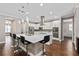 Spacious kitchen with island, stainless steel appliances, and hardwood floors at 5222 Waterside Vista Ln, St Cloud, FL 34771