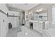 Luxurious bathroom with double vanity, large shower, and soaking tub at 5222 Waterside Vista Ln, St Cloud, FL 34771