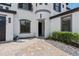Front entrance with landscaping and a paved walkway at 5222 Waterside Vista Ln, St Cloud, FL 34771