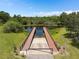 Community boat ramp with two wooden bridges over calm water at 5222 Waterside Vista Ln, St Cloud, FL 34771