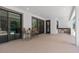 Outdoor patio with seating area and pool view at 5222 Waterside Vista Ln, St Cloud, FL 34771