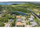 Aerial view of upscale homes near a tranquil lake at 5222 Waterside Vista Ln, St Cloud, FL 34771