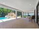 Covered patio overlooking the refreshing pool and spa at 5222 Waterside Vista Ln, St Cloud, FL 34771