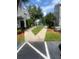 Concrete walkway leading to the community amenities at 1620 Columbia Arms Cir # 263, Kissimmee, FL 34741