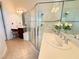 Spa-like bathroom with a walk-in shower and vanity at 709 Carmel Ln, Kissimmee, FL 34759