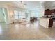 Bright and airy living room with tile floors, comfortable seating, and open floorplan at 709 Carmel Ln, Kissimmee, FL 34759