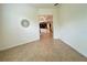 Empty room with neutral walls and tile flooring at 709 Carmel Ln, Kissimmee, FL 34759