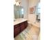 Clean bathroom with tub shower combo and vanity at 709 Carmel Ln, Kissimmee, FL 34759