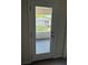 White door leading to a private balcony with view at 2414 Fenetre Ln, Kissimmee, FL 34741