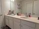Double vanity bathroom with updated fixtures at 2414 Fenetre Ln, Kissimmee, FL 34741