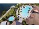 Resort-style pool with a splash pad at 2414 Fenetre Ln, Kissimmee, FL 34741