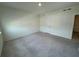 Simple bedroom with carpet and neutral walls at 4422 Small Creek Rd # 72, Kissimmee, FL 34744