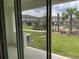 View of backyard with community pool and other townhomes at 4422 Small Creek Rd # 72, Kissimmee, FL 34744