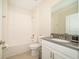Small bathroom with a single vanity, tub, and shower at 2744 Bookmark Dr, Kissimmee, FL 34746