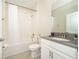 Small bathroom with a tub, shower, and single vanity at 2744 Bookmark Dr, Kissimmee, FL 34746