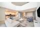 Open living room with a large sectional sofa and high ceilings at 2744 Bookmark Dr, Kissimmee, FL 34746