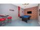 Game room with a pool table and bar-height seating at 2744 Bookmark Dr, Kissimmee, FL 34746