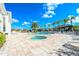 Community pool and spa with plenty of lounge chairs at 3227 Cupid Pl, Kissimmee, FL 34747
