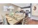 Dining area with table and chairs, open to kitchen at 3227 Cupid Pl, Kissimmee, FL 34747