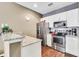 Modern kitchen with stainless steel appliances and granite counters at 3227 Cupid Pl, Kissimmee, FL 34747