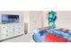 Charming bedroom with a twin-size bed and themed decor at 3227 Cupid Pl, Kissimmee, FL 34747